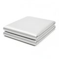A stack of three neatly folded white bed sheets on a white background Royalty Free Stock Photo