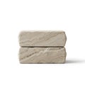 Two beige stone blocks stacked on a white background with a slight shadow effect Royalty Free Stock Photo
