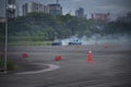 distance scene of amateur driver practicing car drifting. Royalty Free Stock Photo