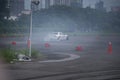 distance scene of amateur driver practicing car drifting. Royalty Free Stock Photo