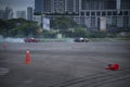 distance scene of amateur driver practicing car drifting. Royalty Free Stock Photo