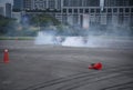 distance scene of amateur driver practicing car drifting. Royalty Free Stock Photo