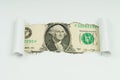 The image of a dollar is visible in the torn hole in the sheet of paper Royalty Free Stock Photo