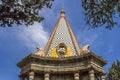 Image of the dome of the Egyptian chapel in the form of a pyramid and two statues of mourners Royalty Free Stock Photo