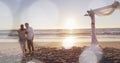 Image of dots over happy african american newly married couple on beach Royalty Free Stock Photo