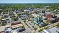 Downtown with churches Fort Wayne cityscape city houses businesses summer aerial