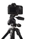 Image of DSLR camera on tripod isolated over white background Royalty Free Stock Photo