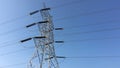 Electricity transmission towers with glowing wires Royalty Free Stock Photo