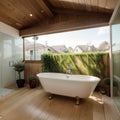 Elegant attic bathroom with stylish bathtub wooden floor and balcony door Royalty Free Stock Photo