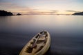 Empty canoe floating on the sea