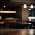 Empty dark wooden table in front of abstract blurred bokeh background of restaurant can be used for display or montage your Royalty Free Stock Photo