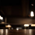 Empty dark wooden table in front of abstract blurred bokeh background of restaurant can be used for display or montage your Royalty Free Stock Photo