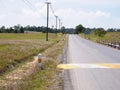 The image of an empty road stretched out. With electric poles on the side With sky background Royalty Free Stock Photo