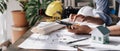 Image of engineer drawing a blue print design building or house, An engineer workplace with blueprints, pencil Royalty Free Stock Photo