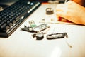 Image of engineer with soldering iron repairing mechanism Royalty Free Stock Photo