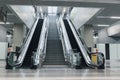 Entrance of moving escalator in modern building to a subway stat Royalty Free Stock Photo