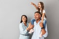 Image of european happy family woman and man smiling and looking