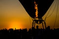 Image of evening light with silhouette balloon.