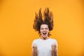 Excited young woman make winner gesture. Royalty Free Stock Photo