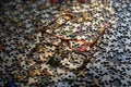 Image of eye glasses casting a shadow on a large group of puzzle pieces Royalty Free Stock Photo