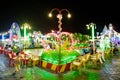 Image of fair games in Phnom Penh Cambodia. Image at night of colorful recreation activities.