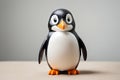 Adorable Penguin Figurine on Beige Background