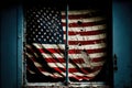 American flag in the window of an old abandoned building. The concept of war and political conflicts.