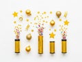 Christmas decorations and party poppers isolated on white background Royalty Free Stock Photo