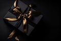 Black Gift Box with Golden Bow Overhead View Royalty Free Stock Photo