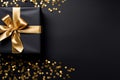 Black Gift Box with Golden Bow Overhead View Royalty Free Stock Photo