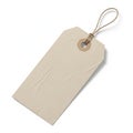 A beige shipping tag with a string loop and hole for attachment Royalty Free Stock Photo