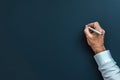 The image features a businessman clutching a pen and exhibiting a writing gesture, complete with space for duplication