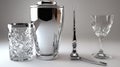 The image features a chic cocktail set, including a martini shaker and garnish knife, captured in a studio with soft Royalty Free Stock Photo