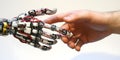 Human and Robotic Hand Interaction Royalty Free Stock Photo