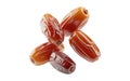 a close-up view of several shiny dates arranged together on a plain white background Royalty Free Stock Photo