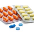 Assorted pills and tablets, isolated on white background Royalty Free Stock Photo