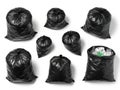 Collection of black garbage bags isolated on white background Royalty Free Stock Photo
