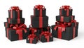 Stacked gift boxes with red ribbons Royalty Free Stock Photo