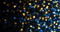 Sparkling blue and gold bokeh background effect Royalty Free Stock Photo