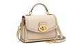 Elegant beige leather handbag with gold accents Royalty Free Stock Photo