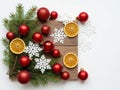 Christmas decorations and oranges isolated on white background Royalty Free Stock Photo