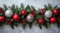 Festive Christmas Border with Red and Silver Balls Hanging in Fir Garland Royalty Free Stock Photo