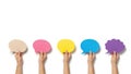 Hands holding colored speech bubbles isolated on white background Royalty Free Stock Photo