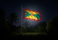 The image features the flag of Grenada illuminated against a Royalty Free Stock Photo