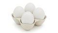 Four eggs in carton isolated on white background Royalty Free Stock Photo