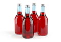 Four empty glass bottles Royalty Free Stock Photo