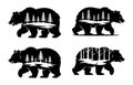 Four Silhouette Bears with Forest and Water Scenes Inside Royalty Free Stock Photo