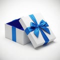 Gift box with blue ribbon isolated on white background Royalty Free Stock Photo