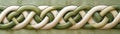 Intricate Celtic Knot Pattern in Elegant Beige and Green Tones Royalty Free Stock Photo