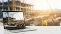 Construction site on laptop screen isolated on white background Royalty Free Stock Photo